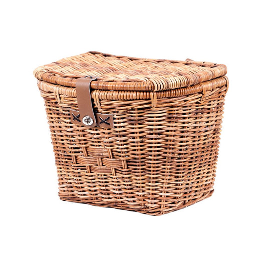 cesta de mimbre con tapa y detalles de piel